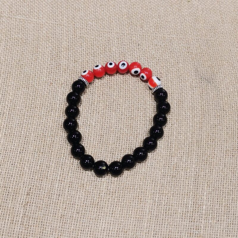 PULSERA MINERAL 8 MM ONIX OJO TURCO ROJO